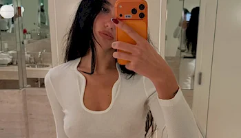 Dua Lipa Takes Braless Selfie In White Top!