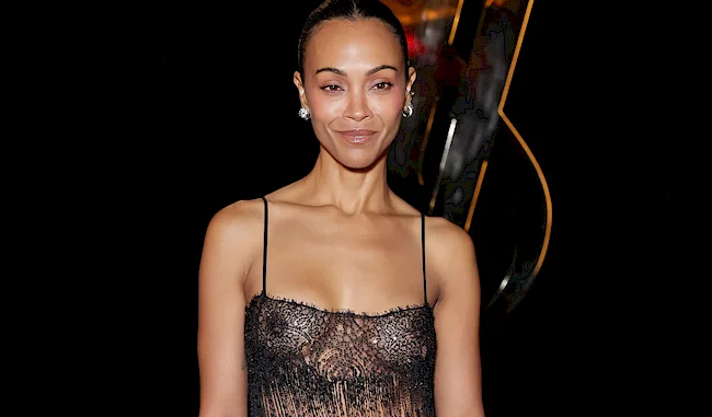 Zoe Saldaña In Sheer Lace Dress At ‘Saint Laurent’ Fashion Show!