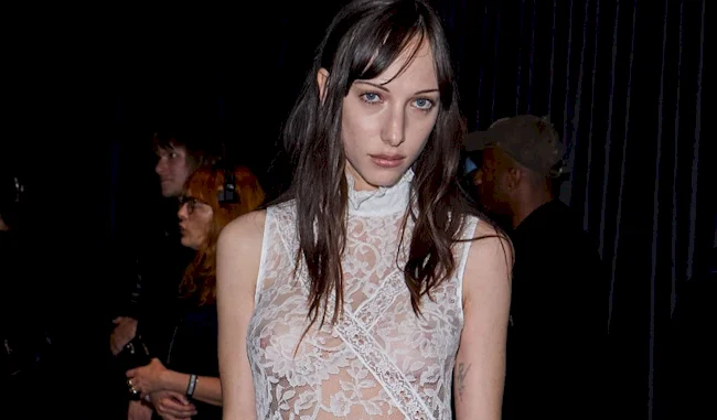 Devon Ross Show Nipples In Sheer Lace Dress At ‘Paris Fashion Week’!